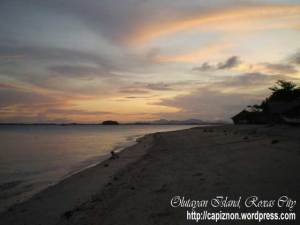 Sunset view at Olutayan Island overlooking Napti Island and Roxas City